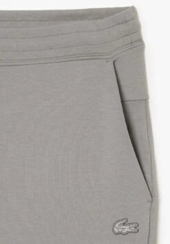 Lacoste Pantalon De Survêtement - Gris -Tenue Sport Homme Magasin 1cd1745c976645c2aef9f9f66ac36551