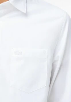 Lacoste Chemise - Blanc 12 Lacoste Chemise - Blanc -Tenue Sport Homme Magasin 34ee6aeb5b8845d185f514df3e81e7a5