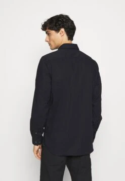 Lacoste Chemise - Abimes -Tenue Sport Homme Magasin 3bab78632ef04b558e114ffea85f591f