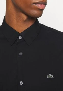 Lacoste Chemise - Noir 11 Lacoste Chemise - Noir -Tenue Sport Homme Magasin 3feda08426984788978007d241a6227c