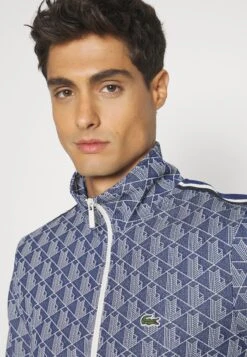 Lacoste Veste De Survêtement - Methylene/Flour 13 Lacoste Veste De Survêtement - Methylene/Flour -Tenue Sport Homme Magasin 850509df6b374078933756a185ce7c35