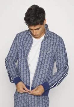 Lacoste Veste De Survêtement - Methylene/Flour 12 Lacoste Veste De Survêtement - Methylene/Flour -Tenue Sport Homme Magasin 8d8b1332f63640148aeac524bcf74097