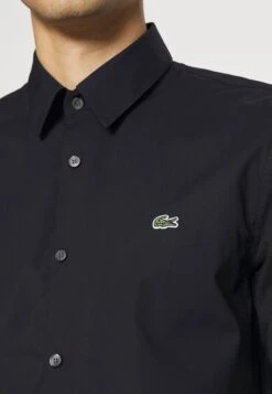 Lacoste Chemise - Abimes -Tenue Sport Homme Magasin a38580932add454b8ac0c527cd949a29