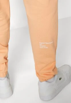Lacoste Pantalon De Survêtement - Orange Clair 15 Lacoste Pantalon De Survêtement - Orange Clair -Tenue Sport Homme Magasin d86a86ec22a8461b83c27c4b0f22a128