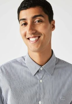 Lacoste Chemise Ml Homme - Chemise - Blancnoir -Tenue Sport Homme Magasin fb38bac8b8ef44bd98edadd06031cdf6